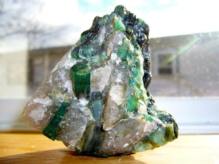 Pegmatites - Quartz pegmatite rock with grass-green Brazilian emerald