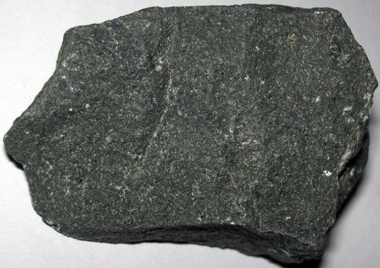 Dark-colored, fine-textured basalt rock appearance image